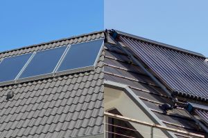Solarthermie mit Flachkollektoren & Vakuumröhren auf zwei Dächern