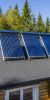3 Solarthemrie-Anlagen mit Vakuumröhren auf einem Dach